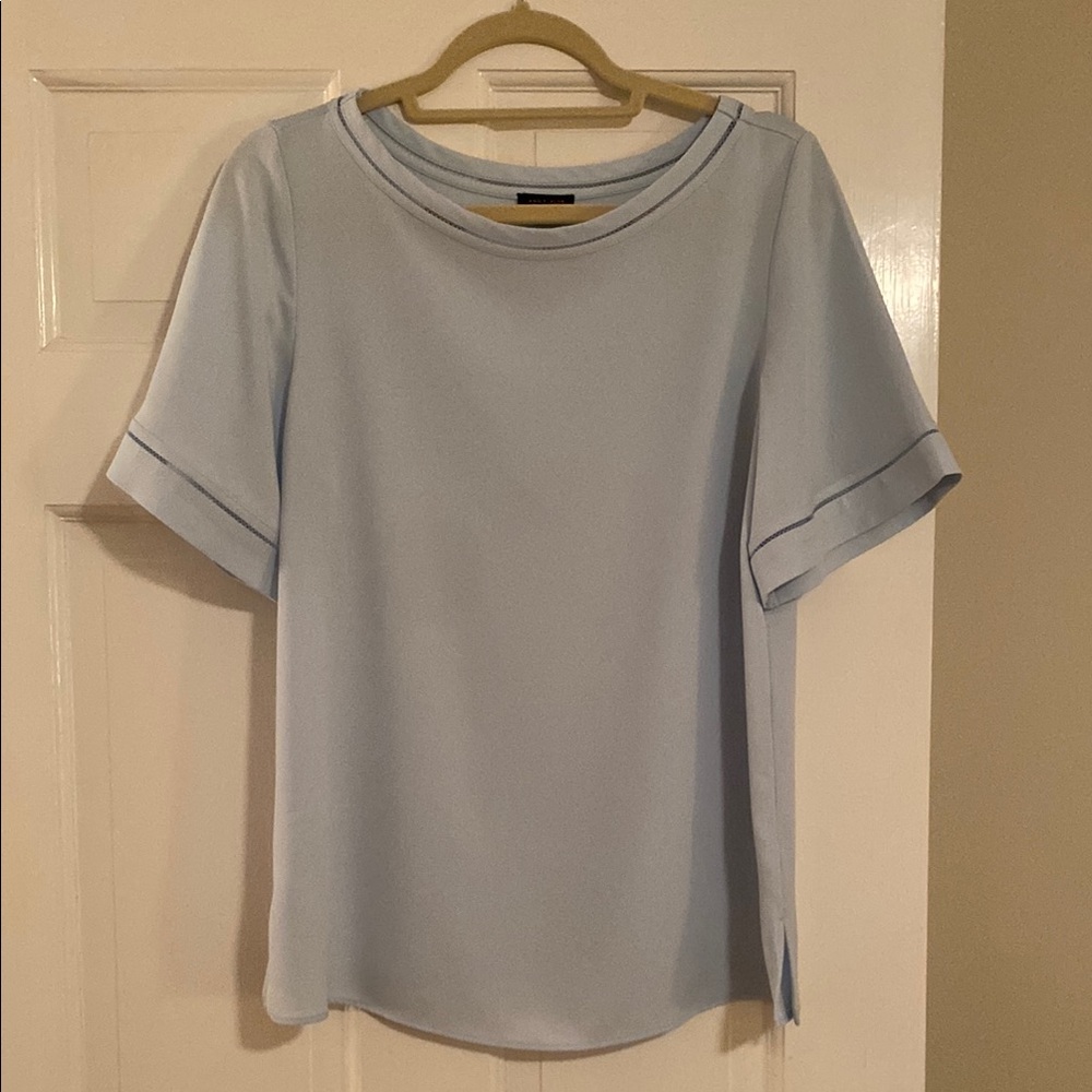 And Taylor light blue top